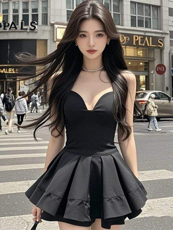 Strapless, slim fit, waist cinching small black dress - Image 1