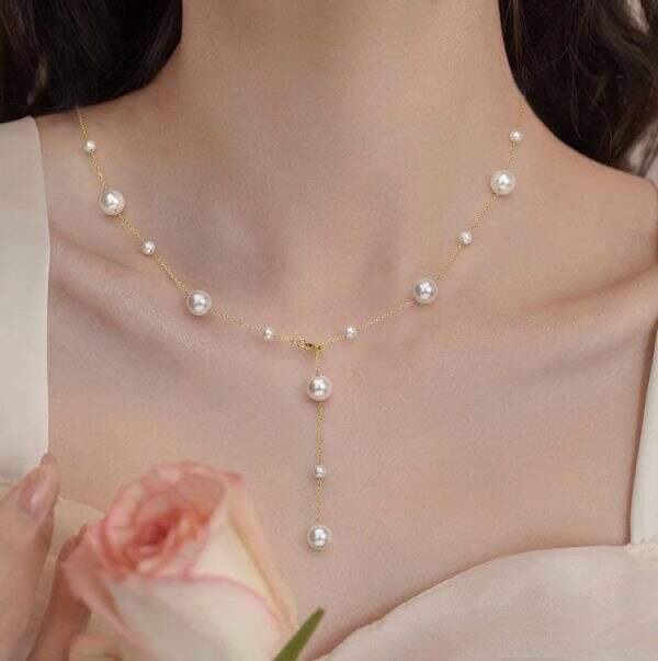 Star shaped pearl tassel necklace - Image 2