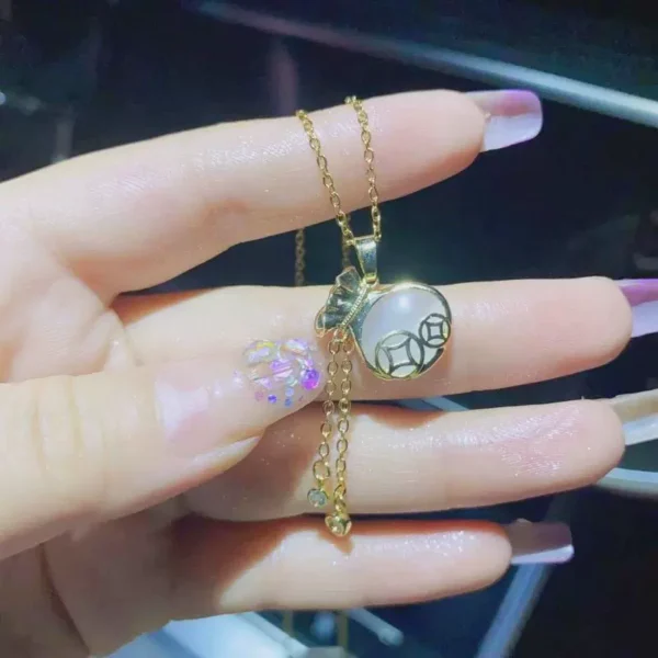 Warehouse imitation cat eye stone tassel money bag - Image 2