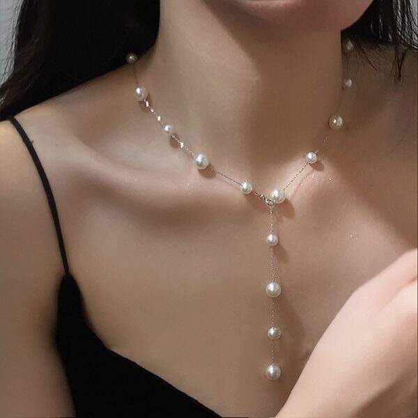 Star shaped pearl tassel necklace - Image 1