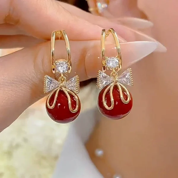 Butterfly knot earrings - Image 1