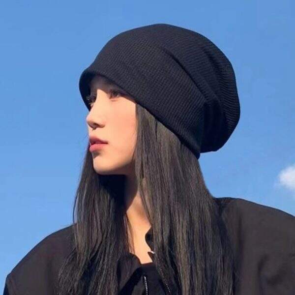 Small face, black hat, female - Image 1
