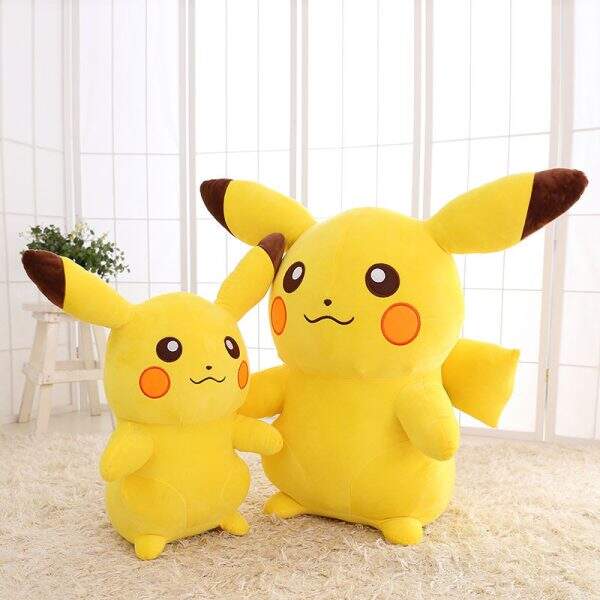 Pillow compared to Pikachu plush toy - Image 2
