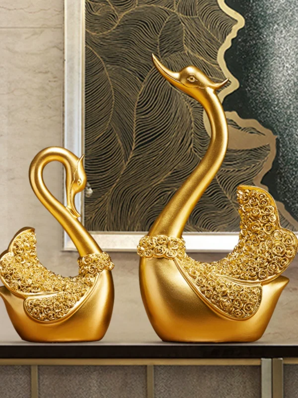 A pair of swan ornaments at the entrance of the living room - Image 2