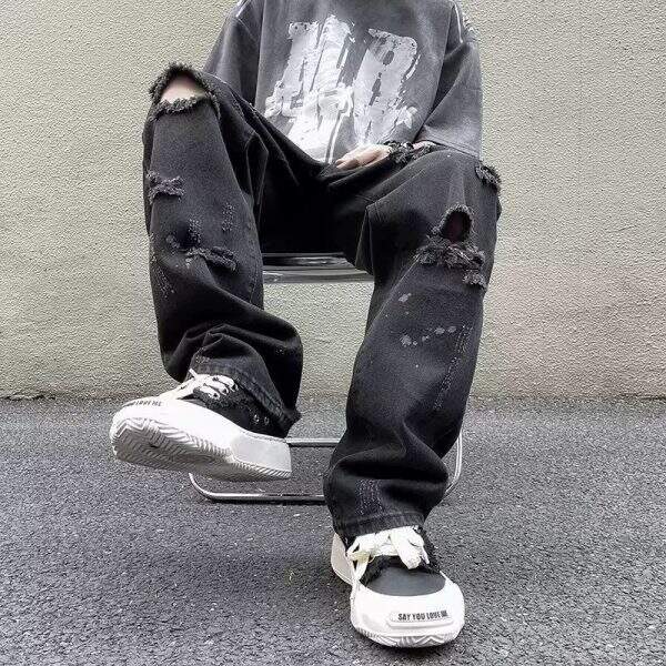 Men's ripped jeans with frayed edges and fading, from a fashionable street brand in the United States. - Image 2