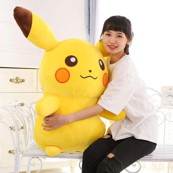 Pillow compared to Pikachu plush toy - Image 3