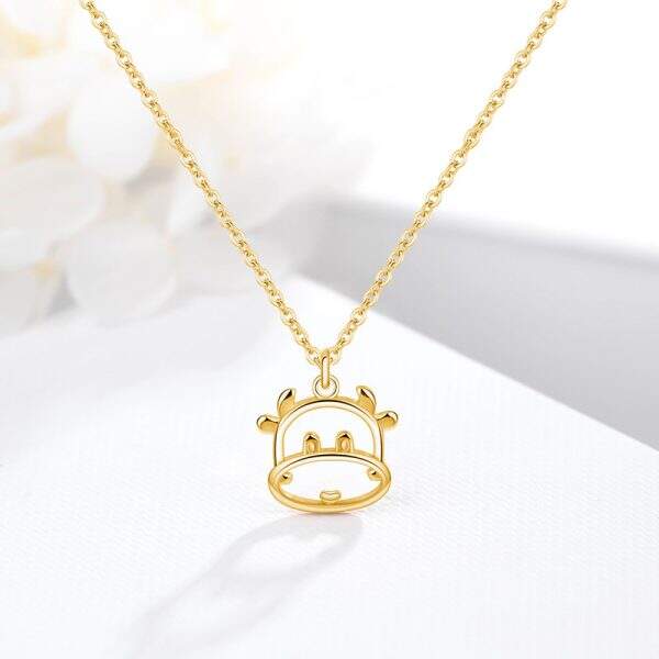 Cute gold-plated hollow cow pendant necklace - Image 1