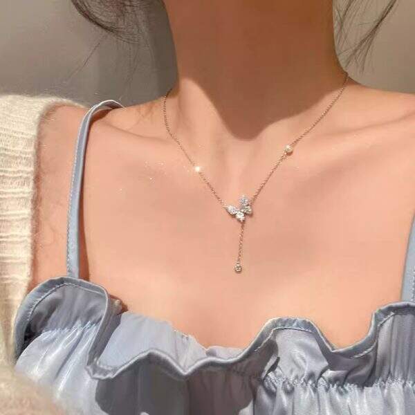Butterfly tassel pearl necklace - Image 1